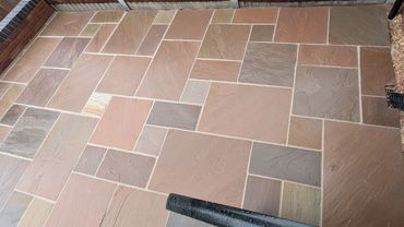 A patio that has been cleaned and repointed.