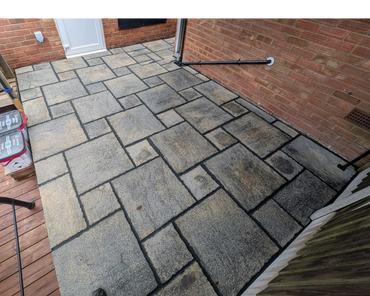 A patio that has been cleaned and repointed.