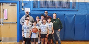 Group of kids taking pictures together