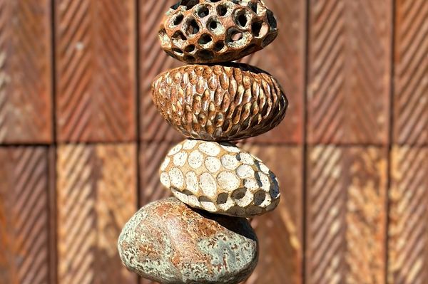 Textured ceramic river rock totem