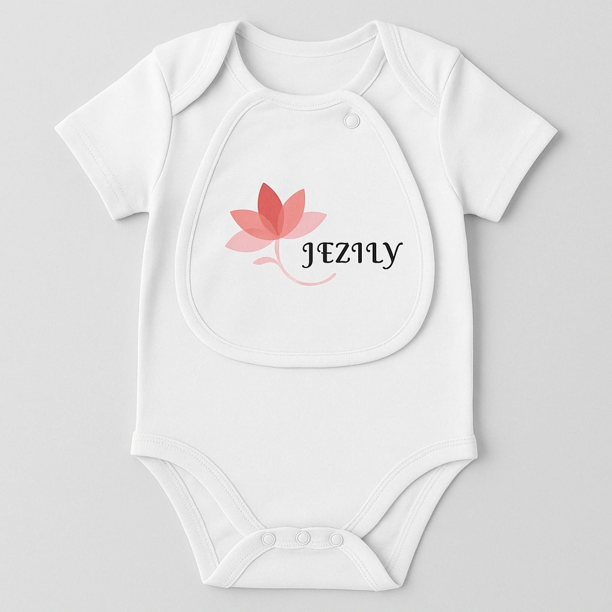 Buttery-soft onesie with magnetic bib for easy changes and cleaner meals.