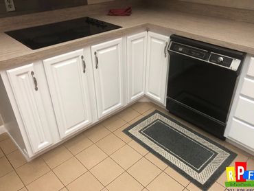 cabinets professionally painted white by Repaint Florida Central Florida's Leading Cabinet painters