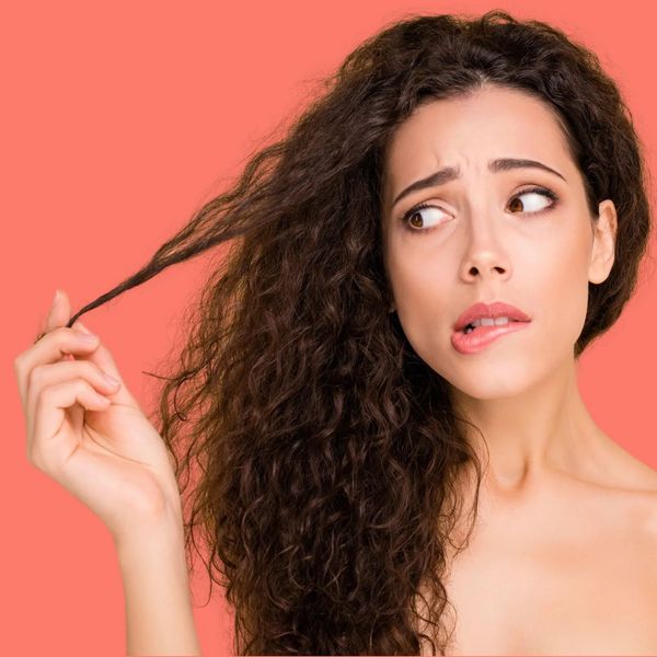 A concerned female because she got a Bad Curly Haircut
Curly Hair Type 2 Medium Brown hair Color