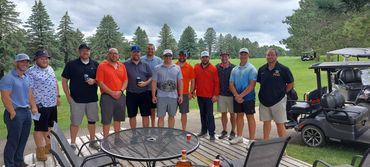 One Person Scramble. Fun "wet' day on the course. Six pound belt awarded to the champ. Four under fo