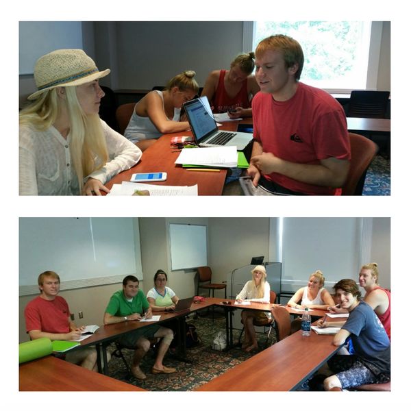 Pics of students in a classroom translating the content into Spanish