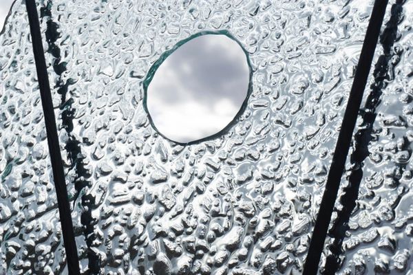 closeup of frosted glass with hole