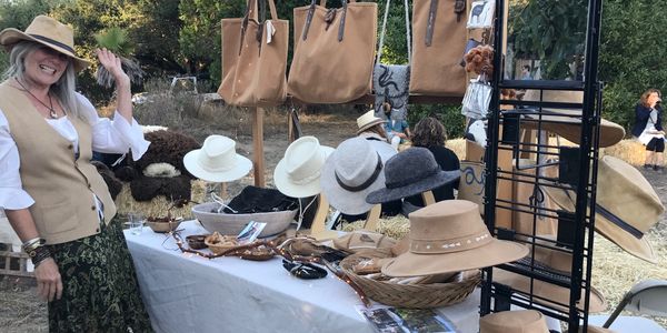 Carol Frechette and her creations of hats and bags at a local Fibershed event