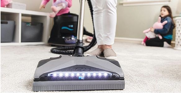 Power Nozzle cleaning the carpets.