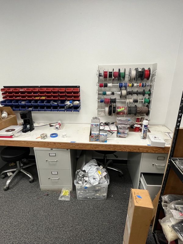 Workshop table with file cabinets spools rolling stool La Verne Business Liquidation