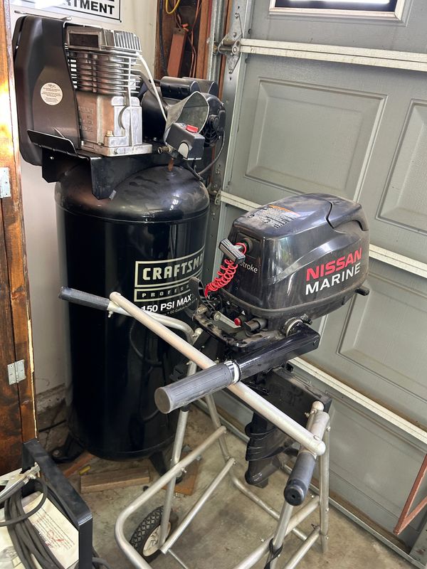 Nissan Marine black boat engine in garage from estate sale in the Pomona Valley