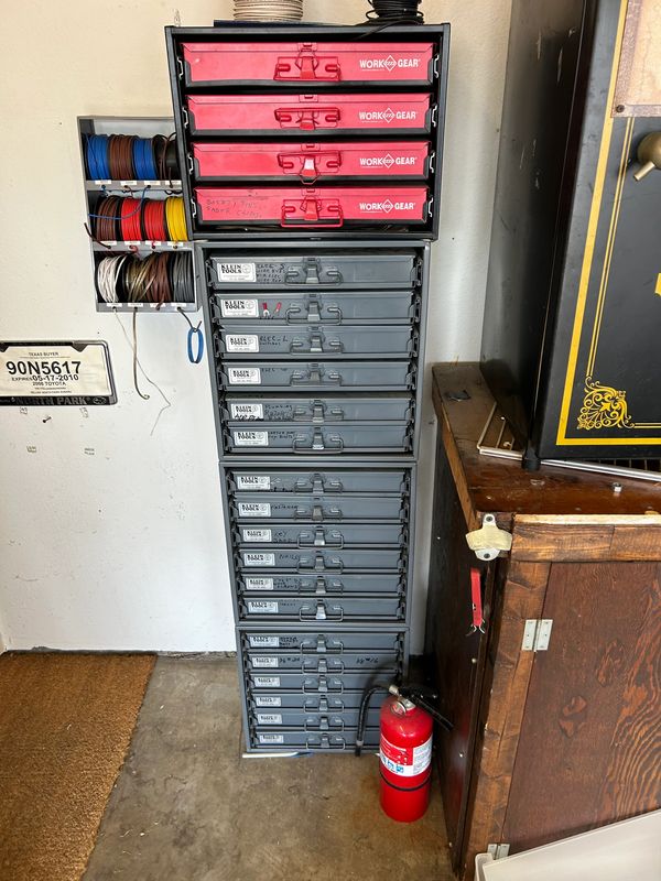 Red and black vertical toolbox for sale from an estate sale in the Pomona Valley