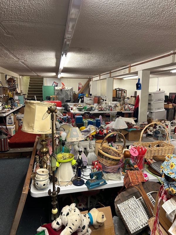 tables with antique vintage collection baskets, lamps, collectibles from Pomona Business Liquidation