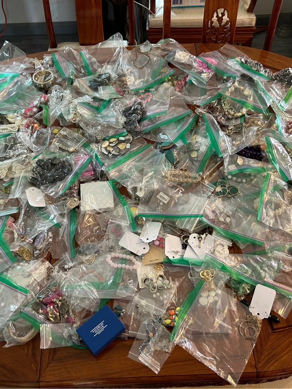collection of jewelry separated into ziploc bags from an estate sale in the pomona valley