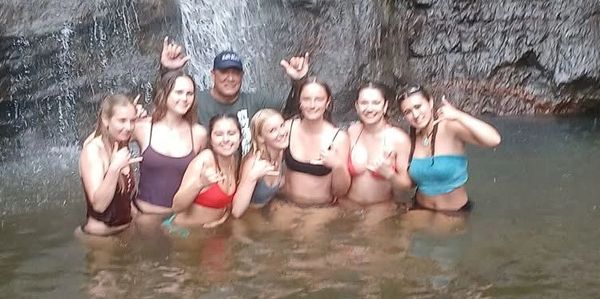 Go in beautiful pristine mountain pools under a waterfall!