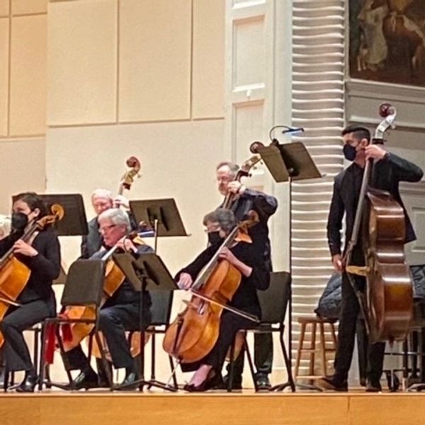 The Reverend Dr. Daniel Rodriguez Schlorff plays the double bass with the American Chamber Orchestra