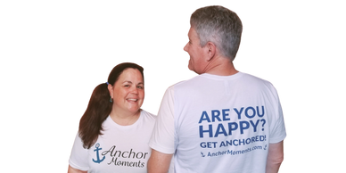 Jeff and Gina show off Anchor Moments T-shirts