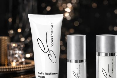 Skincare products from Socheire with elegant packaging on a dark background.
