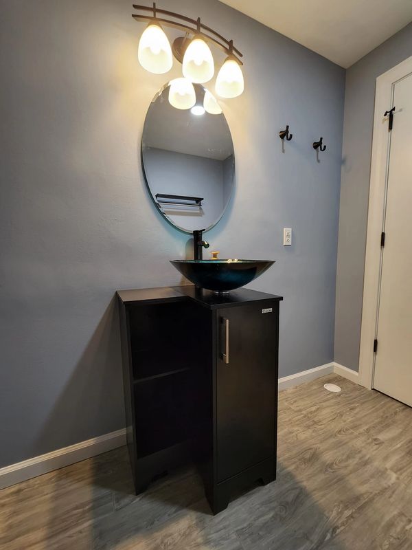 Carmel, IN basement bathroom finishing (unfinished basement prior to remodel)