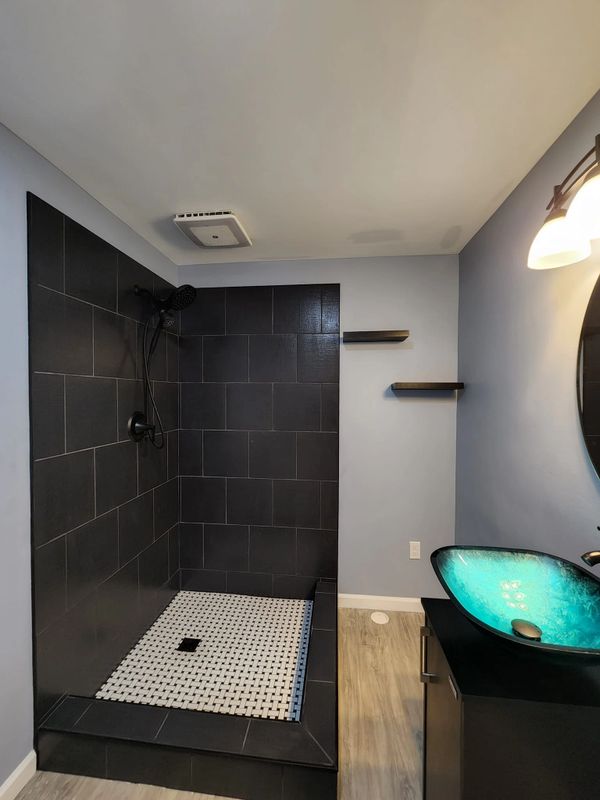 Black 12x12 tile with black grout basement bathroom remodel - Carmel, IN
