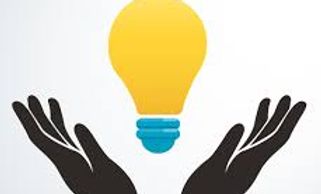 open palms with a light lightbulb . Leeds Corporate Wellbeing mental health workshops for anxiety