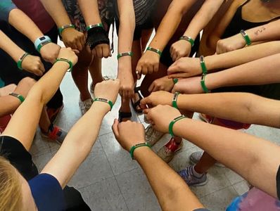 A Group of People Displaying Their Bands