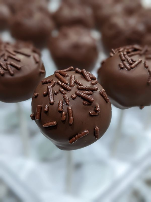 Chocolate cake pop, chocolate candy coating, chocolate sprinkles