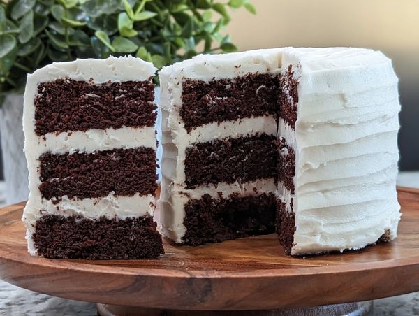 6-inch 3-layer chocolate cake, vanilla frosting between layers, vanilla textured frosting