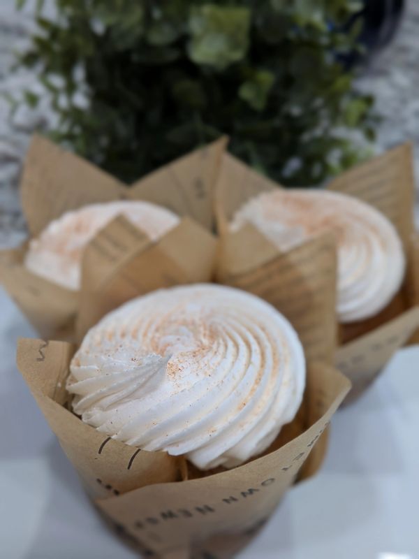 Pumpkin cupcakes, vanilla frosting, cinnamon sugar sprinkles