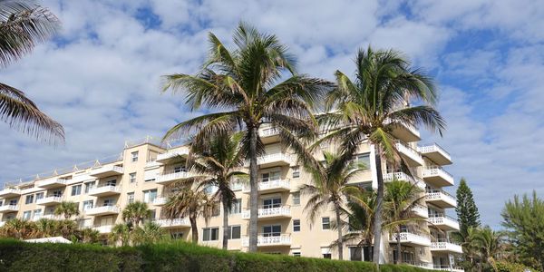 Ocean Towers, 170 N Ocean Blvd., Palm Beach, oceanfront building with palm trees