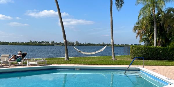 Sutton Place, 2778 S Ocean, Palm Beach, pool with hammock overlooking Intracoastal, condos for sale
