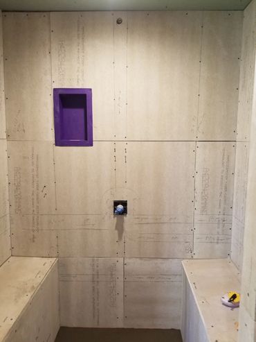 Shower Wall installation, with prior precautions taken into account for pipeage behind