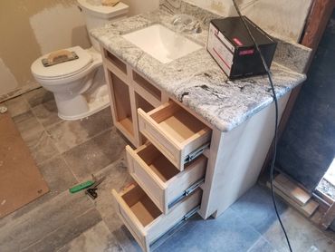 Newly built sink cabinet set in place (Mid- building phase)