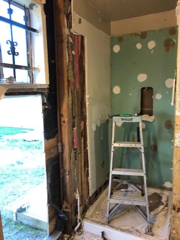 Demolition phase of pre-existing shower