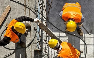 Group of construction workers renovating a home
