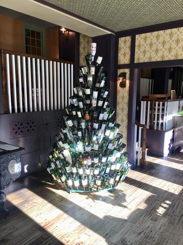 Holiday designed, Troy Selberg built, wine bottle tree. Metal artwork designed for 750ml bottles.
