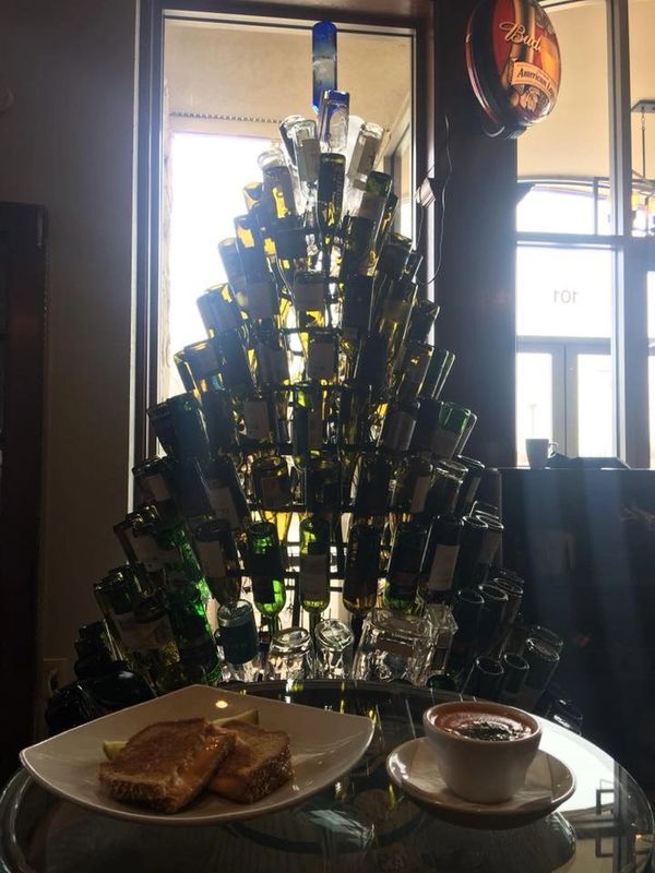 Troy Selberg built bottle tree. 18 below design metal artwork designed for 750ml bottles.