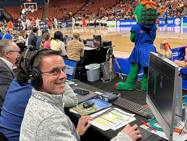 Kyle Ritchie, owner of Ritchie Eventures, runs Daktronics Show Control at SEC basketball tournaments