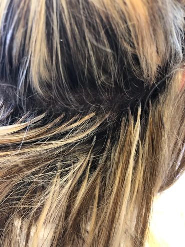 close up of hair extensions in the scalp