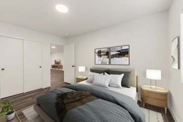 Modern bedroom with neutral tones and minimalistic decor.