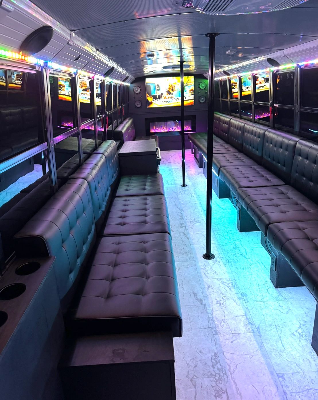 Luxurious limo party bus interior with leather seating and LED lighting in Omaha
