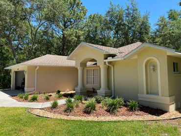 Seamless gutters installed on a house in Spring Hill, Florida.