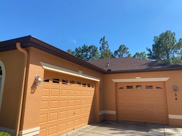 Brown seamless gutters installed on a house in sugar mill woods in Citrus county