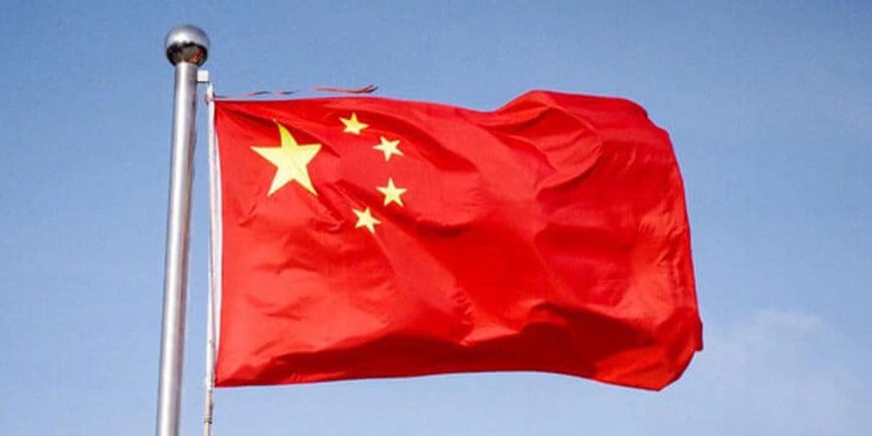 Chinese Flag, blowing in the wind.