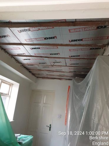 Flat roof insulation installed by smart green homes Ltd team.