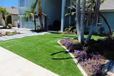 This is an example of a mid-sized contemporary front yard concrete paver landscaping in Orange Count
