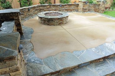 Stone steps, fire circle and seating area