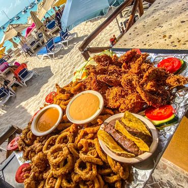 Plates of food on Isla Mujeres, Mexico at Palapa "Leidy"