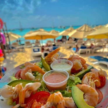 Plates of food on Isla Mujeres, Mexico at Palapa "Leidy"