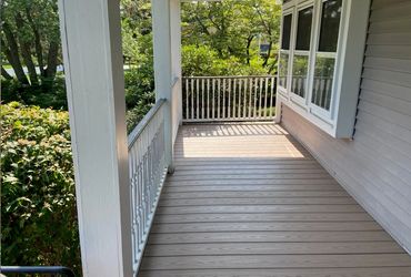 Add and repair front porch on home Hull, Massachusetts