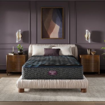 Modern bedroom with a Beautyrest mattress and elegant decor.